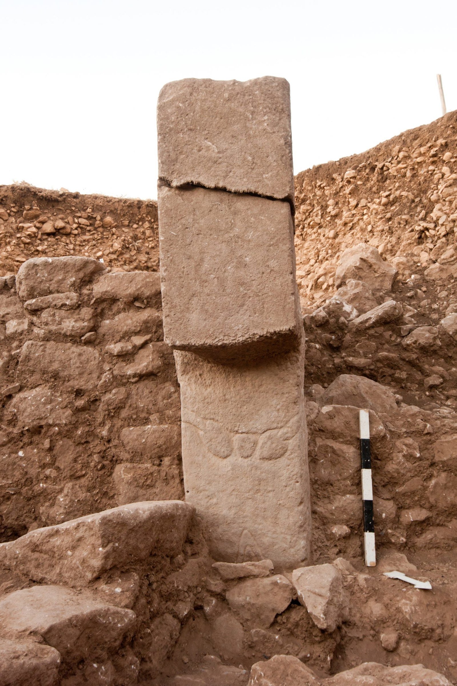 Pillar 57 of Enclosure H with a bull's-head motif low on the shaft
