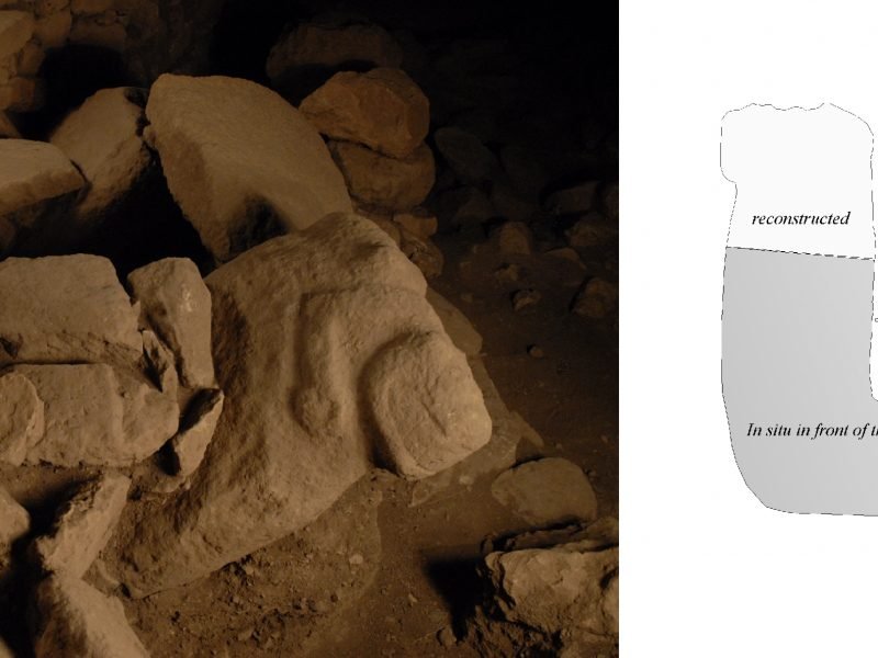 The U-shaped monolith of the Enclosure C entrance, shown beside a reconstruction distinguishing its in-situ and rebuilt parts