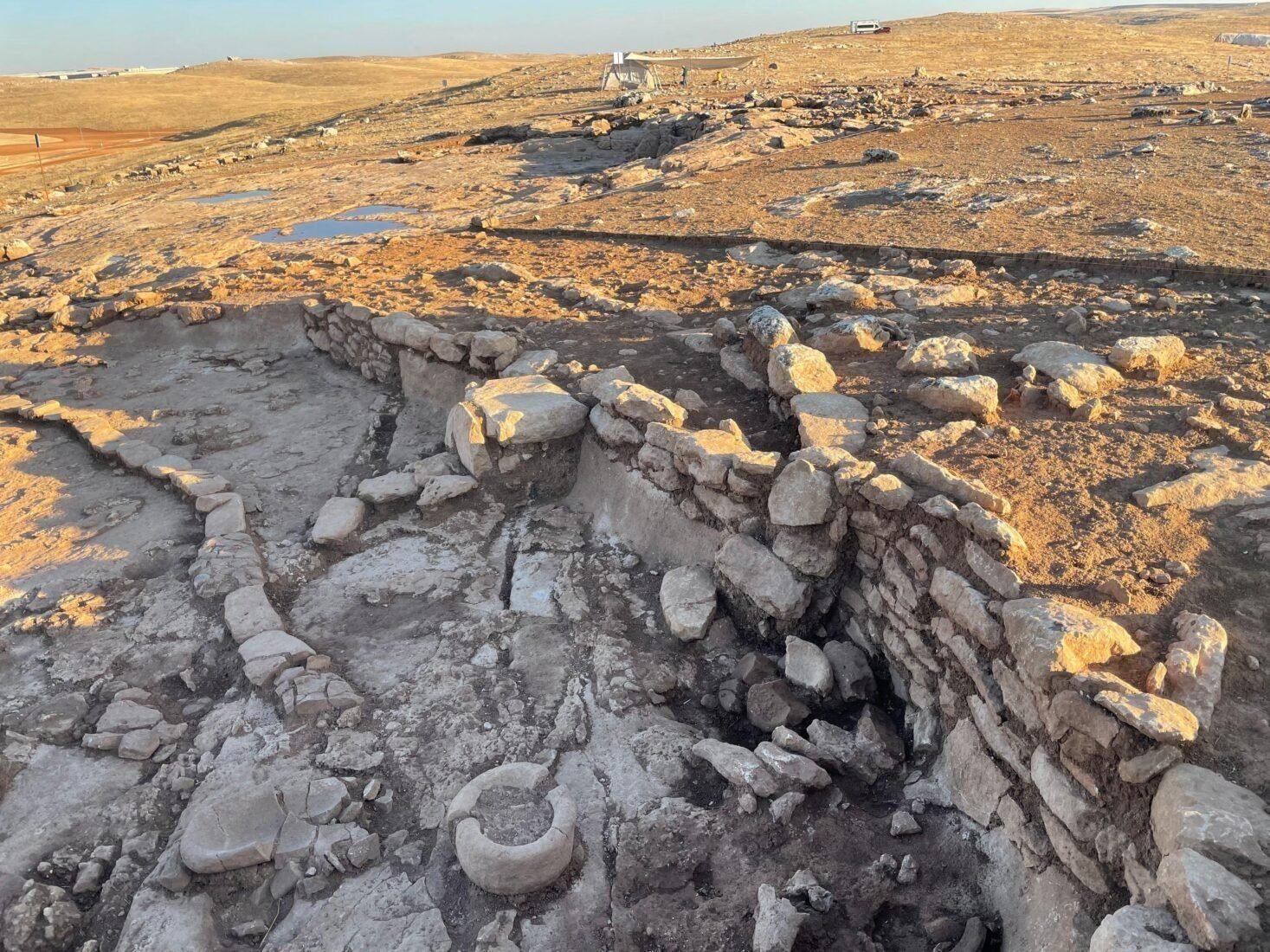 Round, bedrock-cut structures exposed at Çakmaktepe — the semi-subterranean architecture of a settlement that may be a thousand years older than Göbekli Tepe.