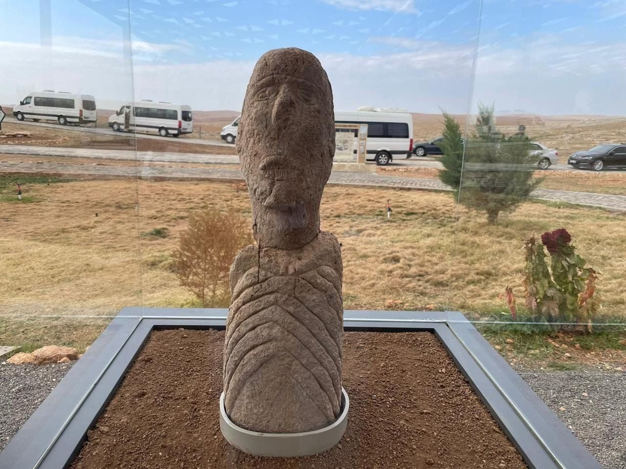 The Sayburç figure with cross-hatching over the mouth, as if sewn shut — reported from a recent season, its context still being pinned down.